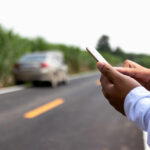 Businessman calling for assistance with his car broken. car insurance concept.