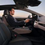 Driver inside 2027 Cadillac OPTIQ